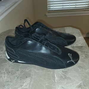 8.5 like new Puma Leather and rubber  shoes